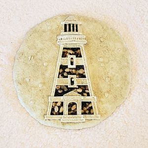 Lighthouse wall plaque.